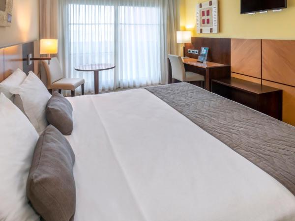 Serhs Natal Grand Hotel & Resort : photo 4 de la chambre chambre double de luxe avec vue latérale sur la mer