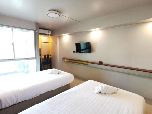 A Sleep Bangkok Sathorn : photo 9 de la chambre chambre lits jumeaux supérieure