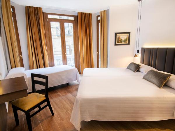 Madrisol : photo 2 de la chambre chambre triple