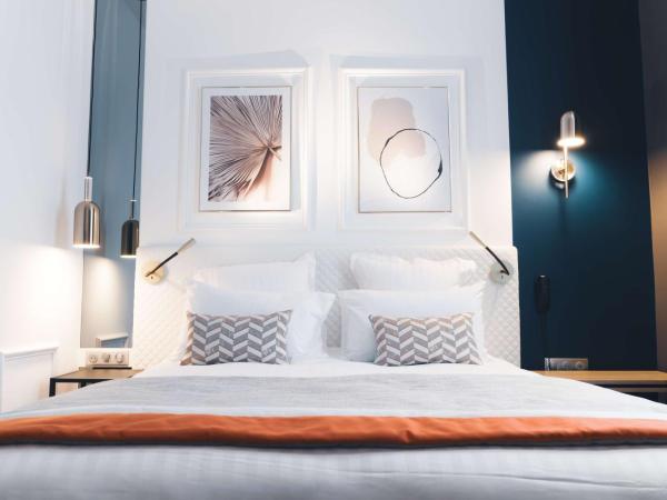 Hôtel D'Anjou : photo 1 de la chambre chambre lit queen-size classique avec climatisation