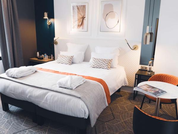 Hôtel D'Anjou : photo 3 de la chambre chambre lit king-size supérieure avec climatisation