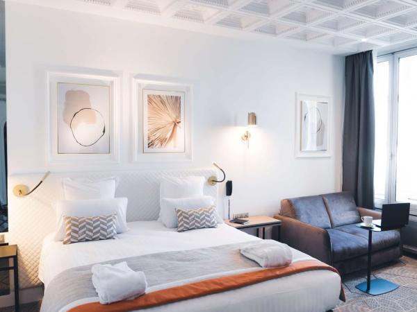 Hôtel D'Anjou : photo 1 de la chambre chambre triple deluxe avec climatisation