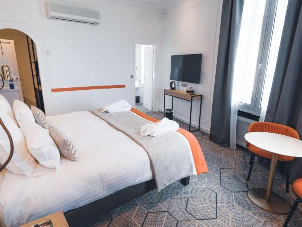 Hôtel D'Anjou : photo 3 de la chambre chambre lit king-size deluxe avec climatisation