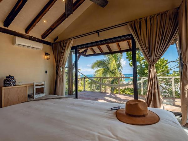 Villa Pescadores Tulum : photo 2 de la chambre chambre double deluxe avec balcon - vue sur mer
