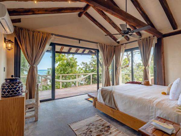 Villa Pescadores Tulum : photo 3 de la chambre chambre double deluxe avec balcon - vue sur mer