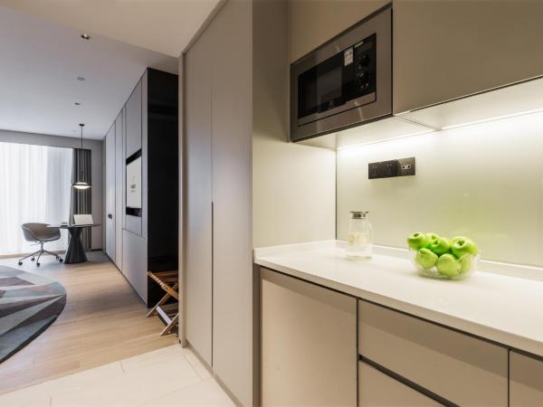 Modena by Fraser Nanjing : photo 2 de la chambre studio deluxe lit king-size