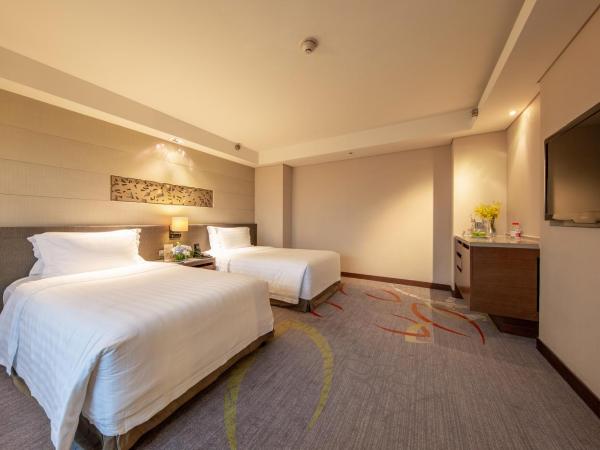 Crowne Plaza Guangzhou City Centre, an IHG Hotel - Free shuttle between hotel and Exhibition Center during Canton Fair & Exhibitor registration Counter : photo 3 de la chambre premium twin room with city view - lounge access