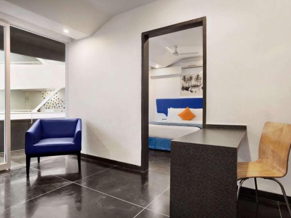 Days Inn & Suites by Wyndham Bengaluru Whitefield : photo 2 de la chambre chambre lit queen-size avec balcon