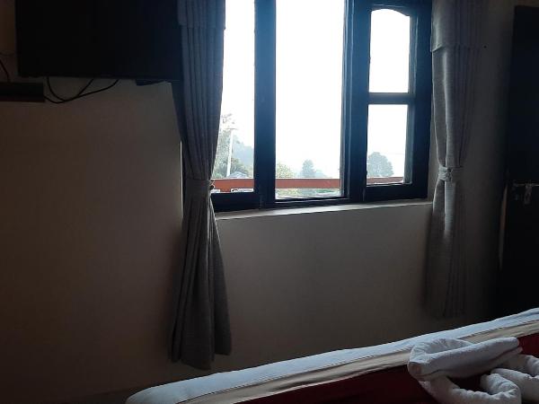 Dulcify cottage sarangkot : photo 3 de la chambre chambre lit king-size