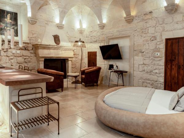 Pollicastro Boutique Hotel : photo 3 de la chambre suite deluxe avec lit king-size