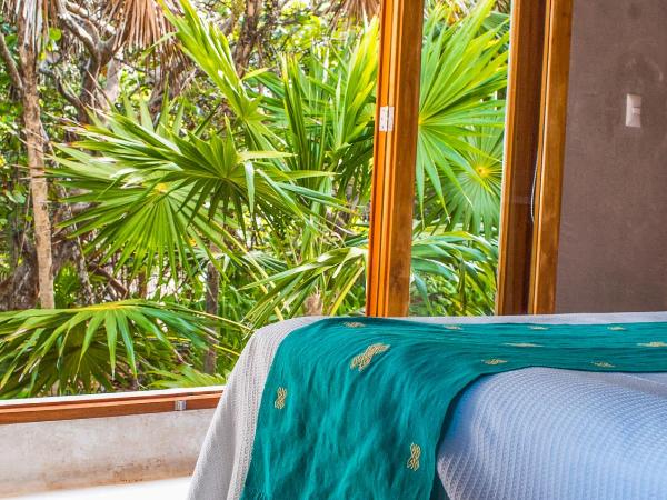 Hotel Poc Na Tulum : photo 1 de la chambre suite casa pocna avec climatisation - vue sur jungle