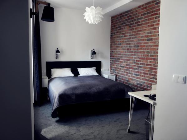 Hotel Grodzka 20 : photo 8 de la chambre chambre lits jumeaux