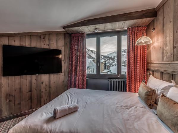 HOTEL LE VAL D'ISERE : photo 6 de la chambre chambre quadruple en duplex