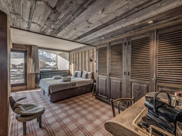 HOTEL LE VAL D'ISERE : photo 4 de la chambre chambre quadruple - vue sur montagnes