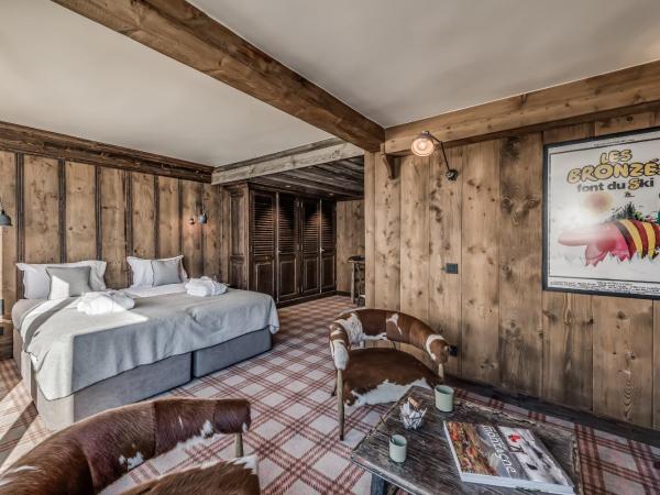 HOTEL LE VAL D'ISERE : photo 8 de la chambre chambre quadruple - vue sur montagnes