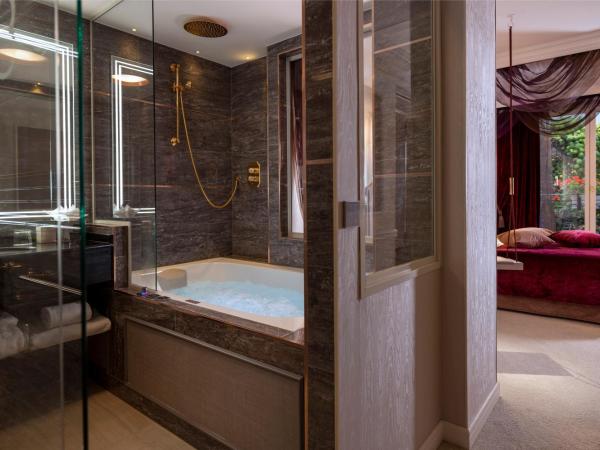 Paris j'Adore Hotel & Spa : photo 1 de la chambre hébergement deluxe précieux avec jacuzzi