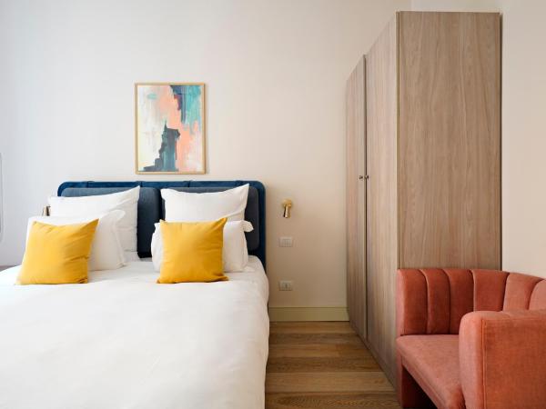 numa I Loreto Apartments : photo 3 de la chambre 1 bedroom apartment with balcony and sofa bed