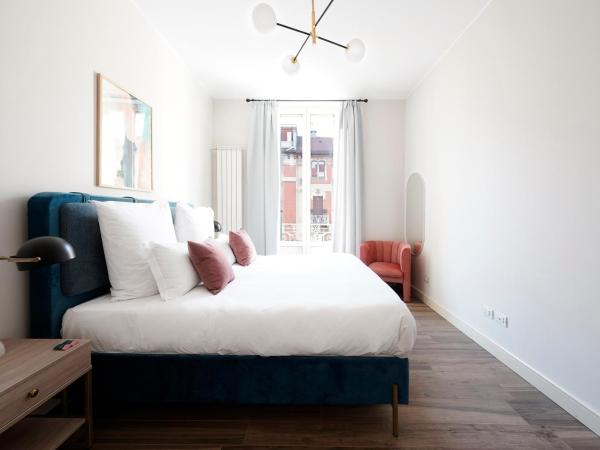 numa I Loreto Apartments : photo 2 de la chambre large 2 bedroom apartment with balcony and sofa bed