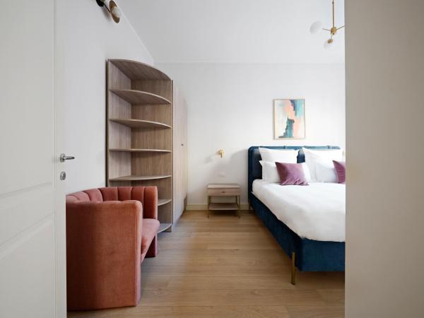 numa I Loreto Apartments : photo 1 de la chambre large 1 bedroom apartment with balcony and sofa bed