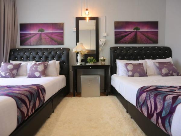 Ghazrin's Garuda Hotel : photo 9 de la chambre chambre familiale supérieure