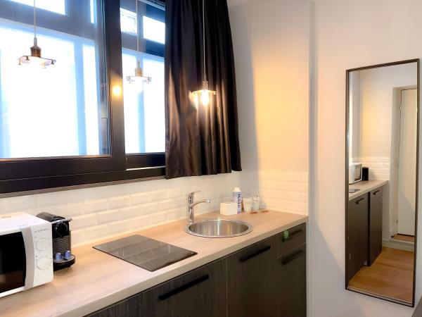 Hotel Litteraire Marcel Ayme, BW Premier Collection : photo 4 de la chambre studio avec kitchenette