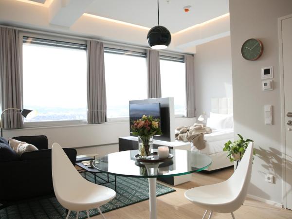 PhilsPlace Full-Service Apartments Vienna : photo 2 de la chambre appartement supérieur