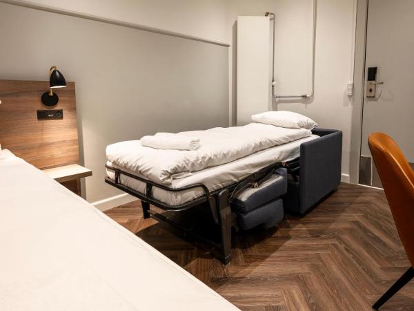 Go Hotel Saga : photo 5 de la chambre chambre triple avec salle de bains commune