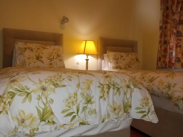 Woodhaven Manor h91rc9d : photo 2 de la chambre chambre lits jumeaux deluxe