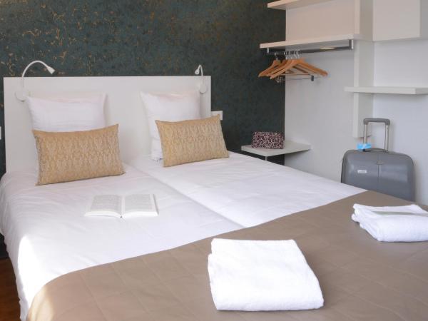 Hotel Arc-En-Ciel Colmar Contact Hotel : photo 5 de la chambre chambre lits jumeaux