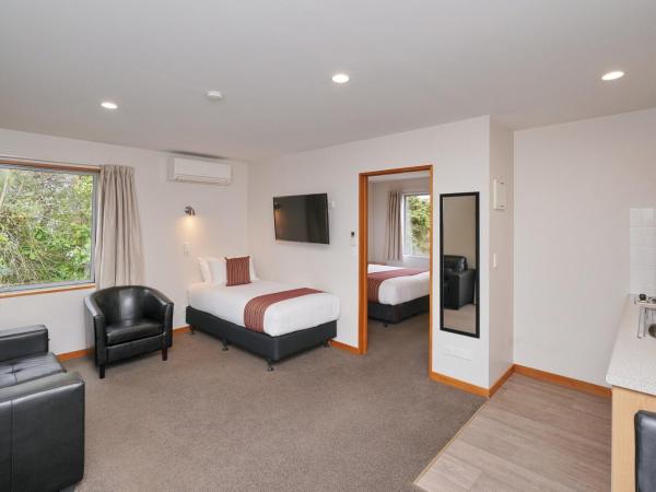 306 Motel Apartments : photo 4 de la chambre appartement 1 chambre avec baignoire spa