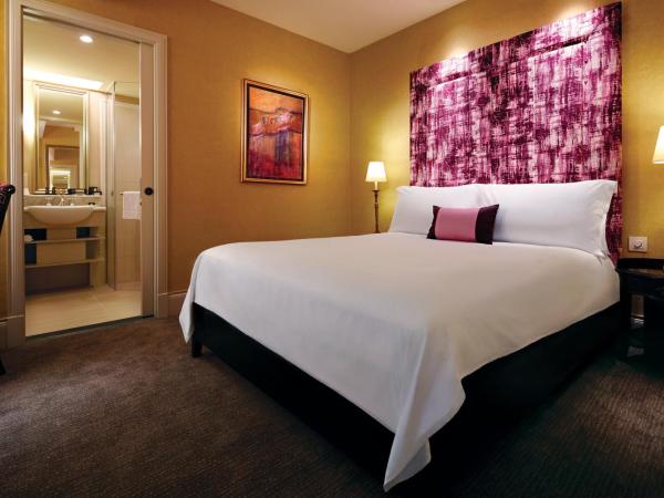 The Scarlet Singapore : photo 4 de la chambre chambre deluxe