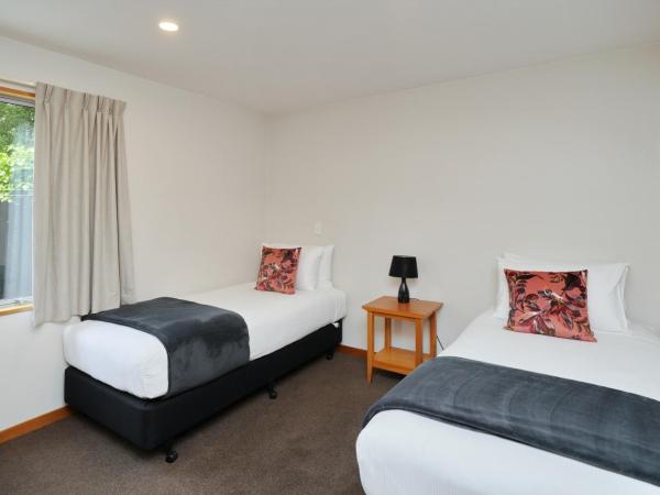 306 Motel Apartments : photo 2 de la chambre appartement 2 chambres avec baignoire spa