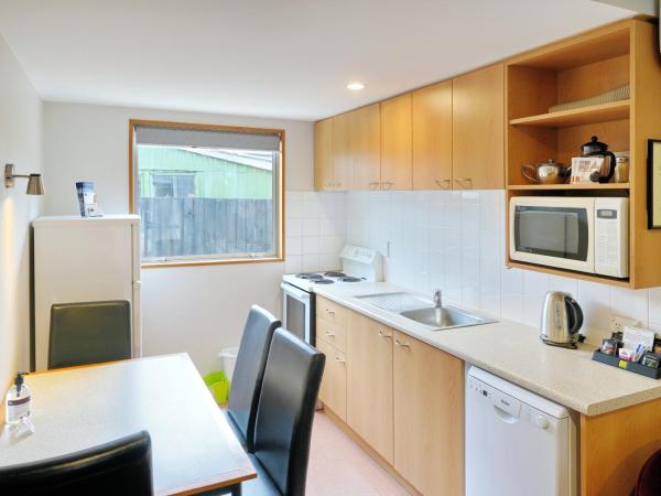 306 Motel Apartments : photo 4 de la chambre appartement 2 chambres avec baignoire spa