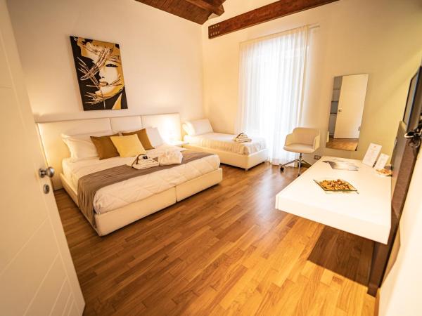 Hotel Cave Del Sole : photo 2 de la chambre chambre triple