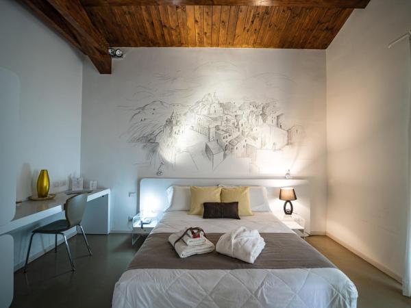 Hotel Cave Del Sole : photo 4 de la chambre chambre double ou lits jumeaux