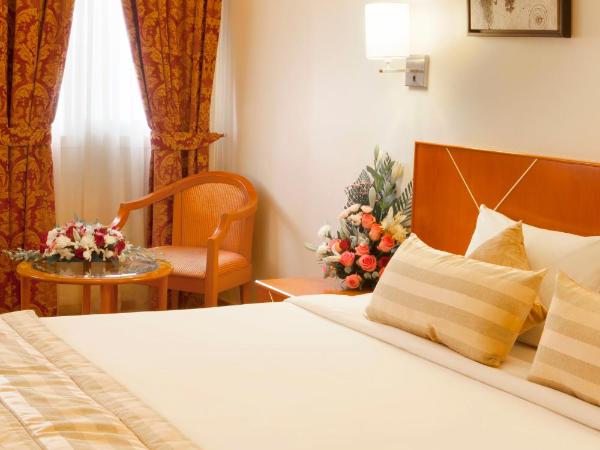 Landmark Hotel : photo 3 de la chambre suite familiale 1 chambre avec lit king-size