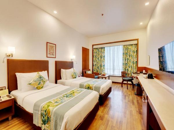 E Square The Fern, Pune : photo 1 de la chambre winter green premium room