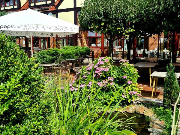 Dom Oliwski : photo 4 de la chambre chambre triple - vue sur jardin