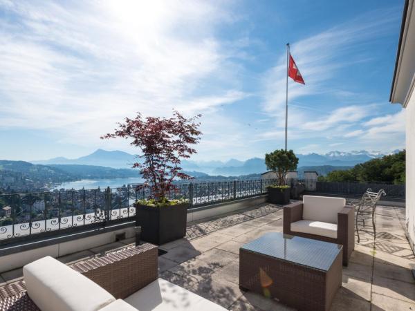 Château Gütsch : photo 2 de la chambre suite de luxe avec terrasse - vue sur lac