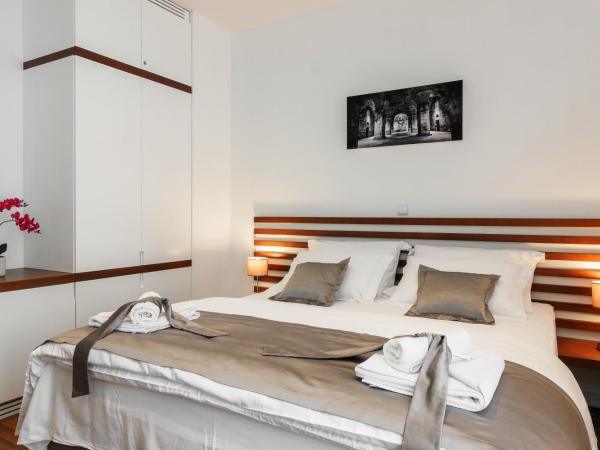 Prima Luxury Rooms : photo 1 de la chambre chambre lit queen-size 