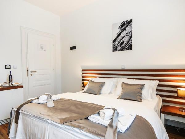 Prima Luxury Rooms : photo 5 de la chambre chambre lit queen-size avec balcon