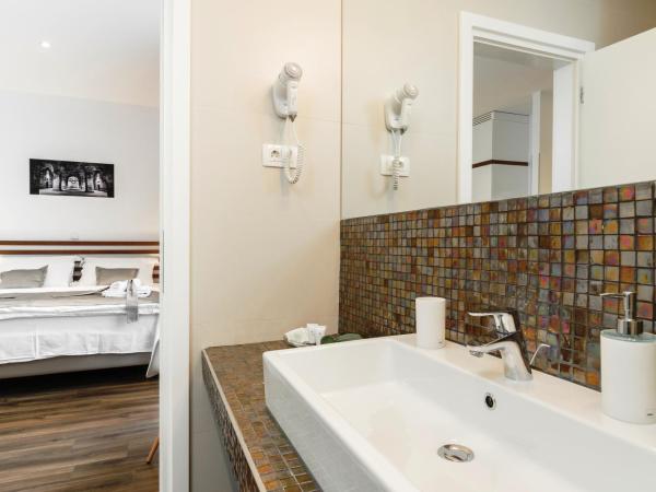 Prima Luxury Rooms : photo 7 de la chambre chambre lit king-size