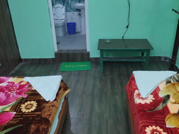 Harry Guest House & Restaurant : photo 6 de la chambre chambre triple deluxe