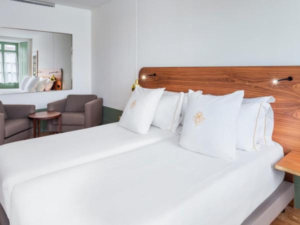 One Shot Aliados Goldsmith 12 : photo 1 de la chambre chambre double ou lits jumeaux premium