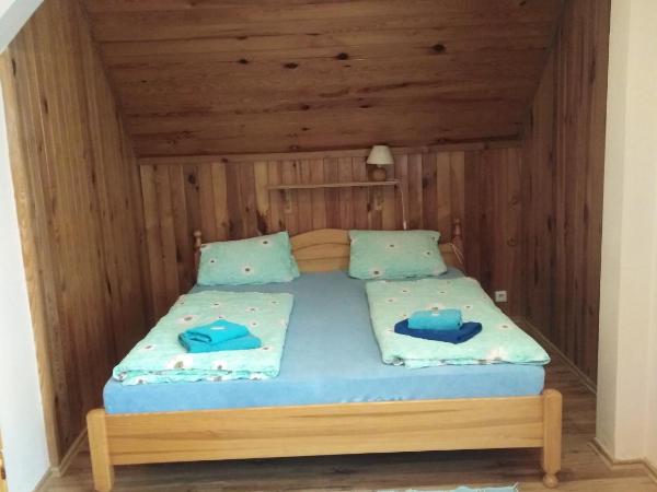 Penzion Olga : photo 1 de la chambre chambre triple avec baignoire