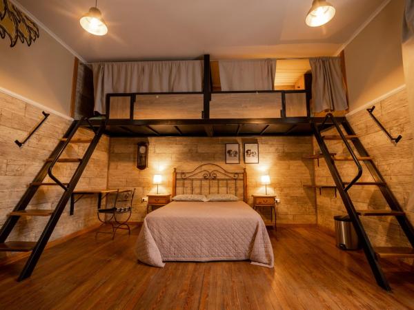 Che Juan Hostel BA : photo 1 de la chambre chambre quadruple avec salle de bains privative