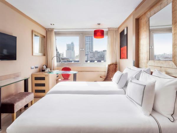 Melia Madrid Princesa : photo 1 de la chambre chambre lits jumeaux