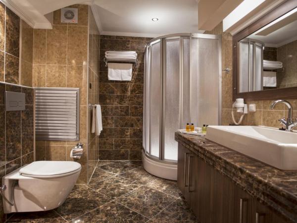 Club Paradiso Hotel & Resort : photo 2 de la chambre suite familiale