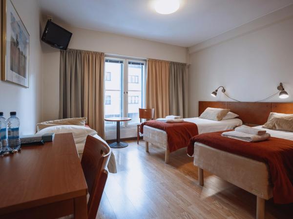 Hotelli Helmi : photo 1 de la chambre chambre triple