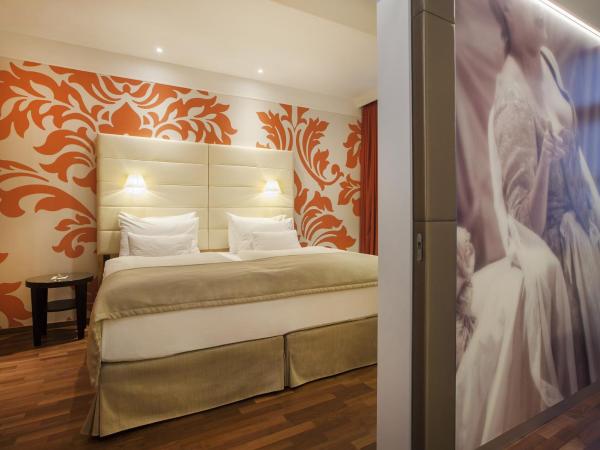 Boutique Hotel Das Tigra : photo 1 de la chambre suite familiale